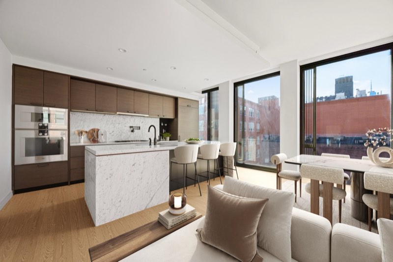kitchen island and dining at 100 Barrow Street 9A