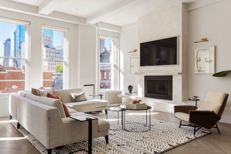 living, fireplace and city windows