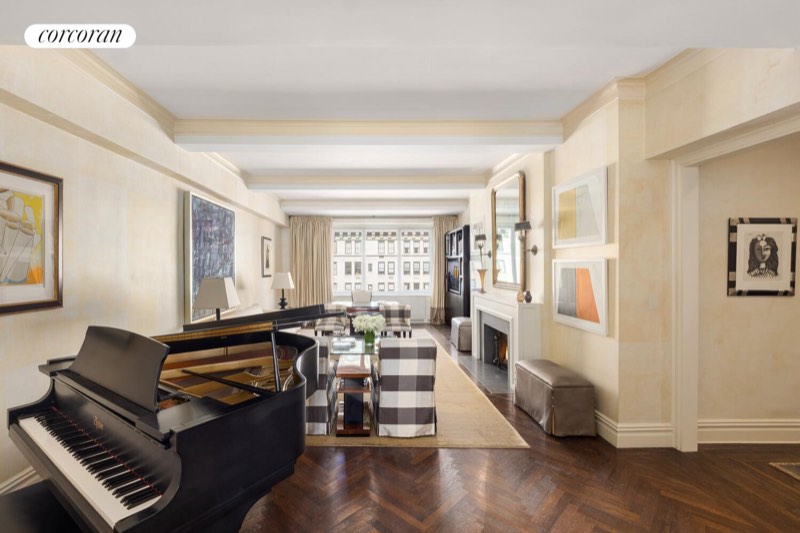 Living room with piano at 1095 Park Avenue 15D, Carnegie Hill — photo 3 of 9