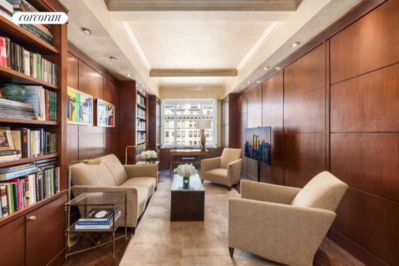 Wood-paneled library at 1095 Park Avenue 15D, Carnegie Hill — photo 5 of 9