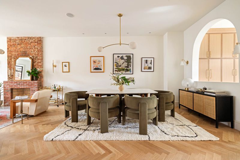 Dining room under an arched opening at 1102 Prospect Place, Crown Heights — photo 2 of 9