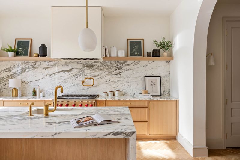 Veined marble backsplash and open shelving at 1102 Prospect Place, Crown Heights — photo 7 of 9