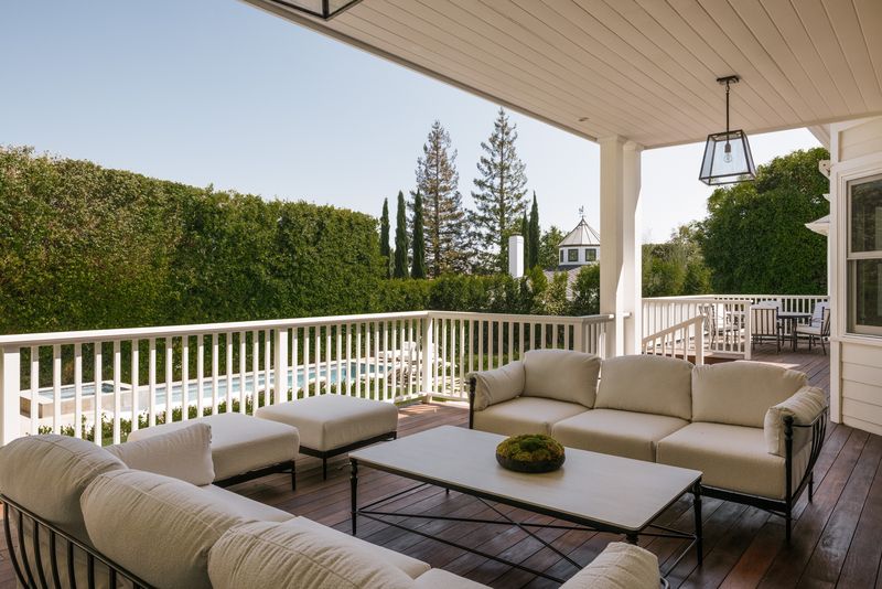 Covered deck lounge at 1228 Amalfi Drive, Pacific Palisades — photo 11 of 12