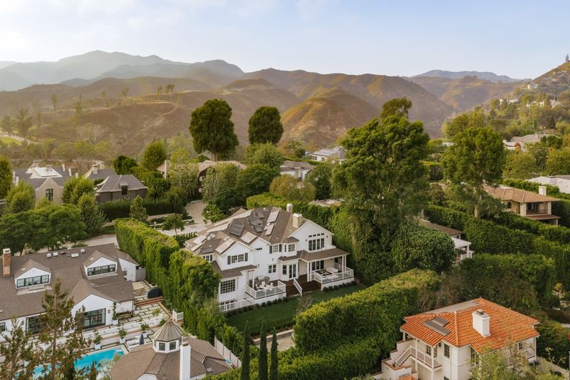 Aerial over the Riviera toward the Santa Monica Mountains at 1228 Amalfi Drive, Pacific Palisades — photo 12 of 12