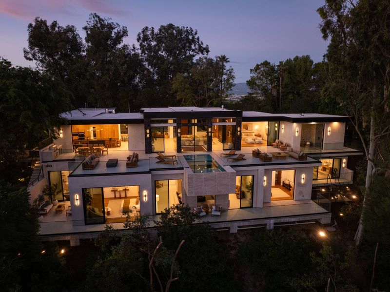 The estate at dusk at 12752 Mulholland Drive, Beverly Hills — photo 8 of 8