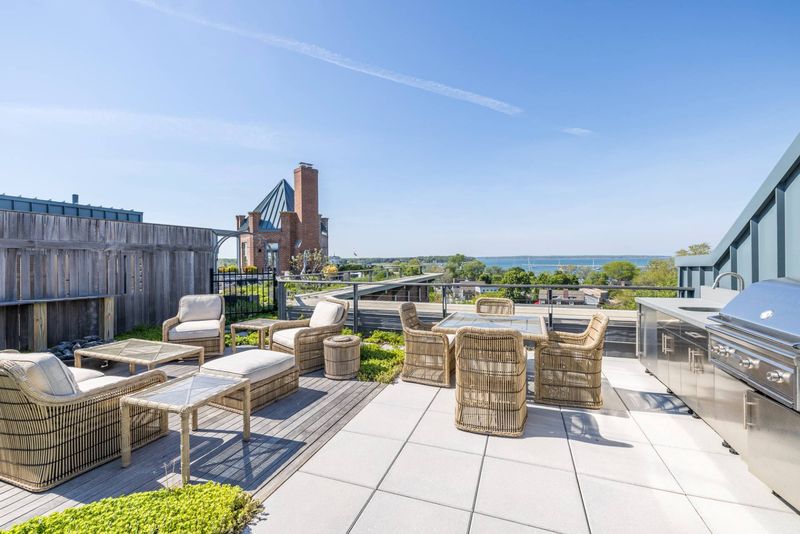 Rooftop terrace with water views at Watchcase, 15 Church Street PH-402, Sag Harbor Village