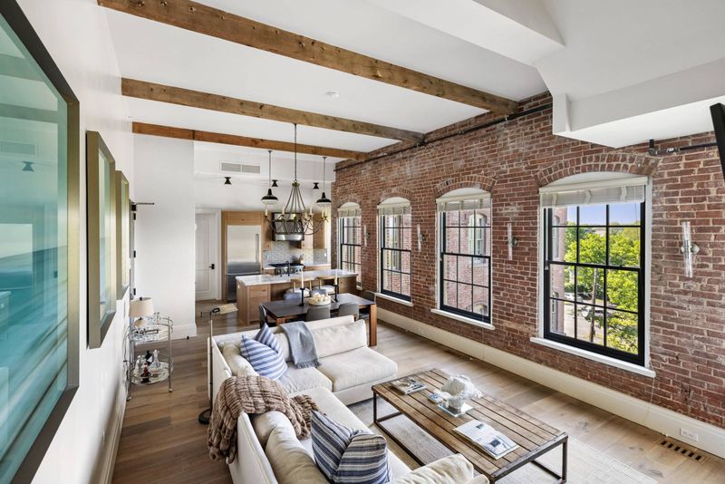 Great room under timber beams at Watchcase, 15 Church Street PH-402, Sag Harbor Village — photo 4 of 8
