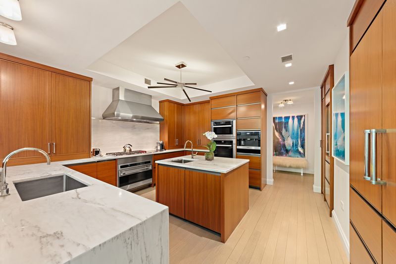 Molteni kitchen with marble island at 150 Charles Street M10, West Village — photo 4 of 12
