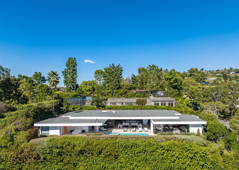 The house on its Trousdale ridge, from above at 1535 Carla Ridge, Trousdale Estates