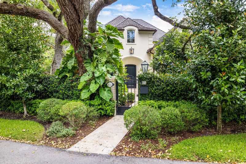 Front entry and landscaped garden at 155 San Souci Drive, Coral Gables — photo 5 of 9