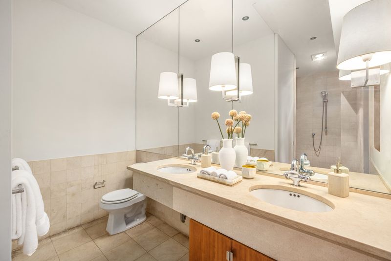 Second bedroom with city views at 170 Fifth Avenue, Unit 5, Flatiron — photo 9 of 10