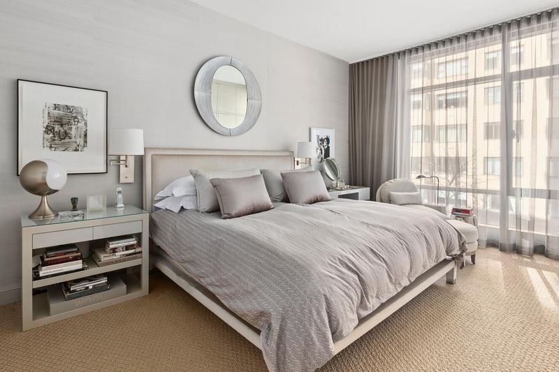 Primary bedroom with silk-papered walls at 170 East End Avenue 3J, Upper East Side — photo 6 of 9
