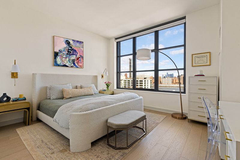 Primary bedroom at 180 Front Street 11E, DUMBO — photo 6 of 9