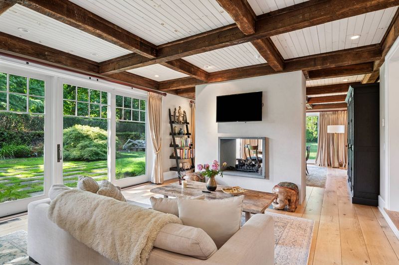 French doors opening to the lawn at 2 Borden Lane, East Hampton — photo 11 of 12