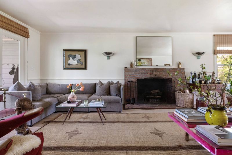 Second living room with fireplace at 216 Sagaponack Road, Bridgehampton — photo 9 of 12