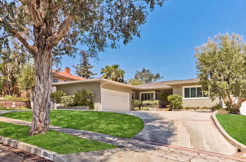 Street elevation with half-moon driveway and address 2302 at 2302 Duxbury Circle, Beverlywood