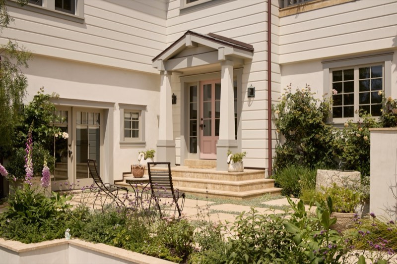 virtually staged entry and pink door
