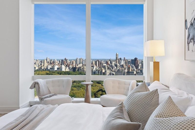 Primary bedroom over Central Park at 25 Columbus Circle 57B, Columbus Circle — photo 5 of 8