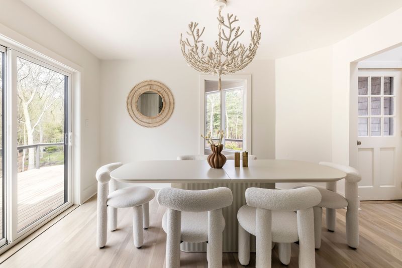 Sitting area beside the fireplace at 25 White Oak Lane, Southampton — photo 6 of 10