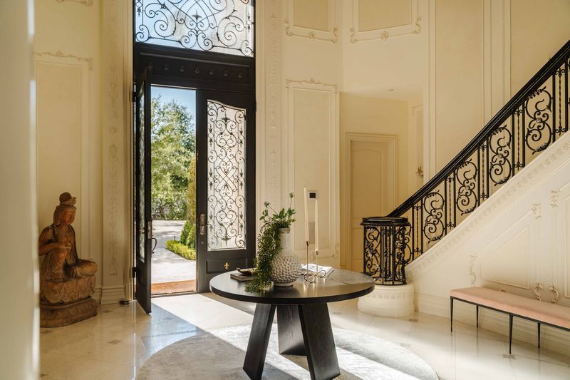 Foyer with polished stone floors at 25242 Prado Del Misterio, Calabasas — photo 3 of 8