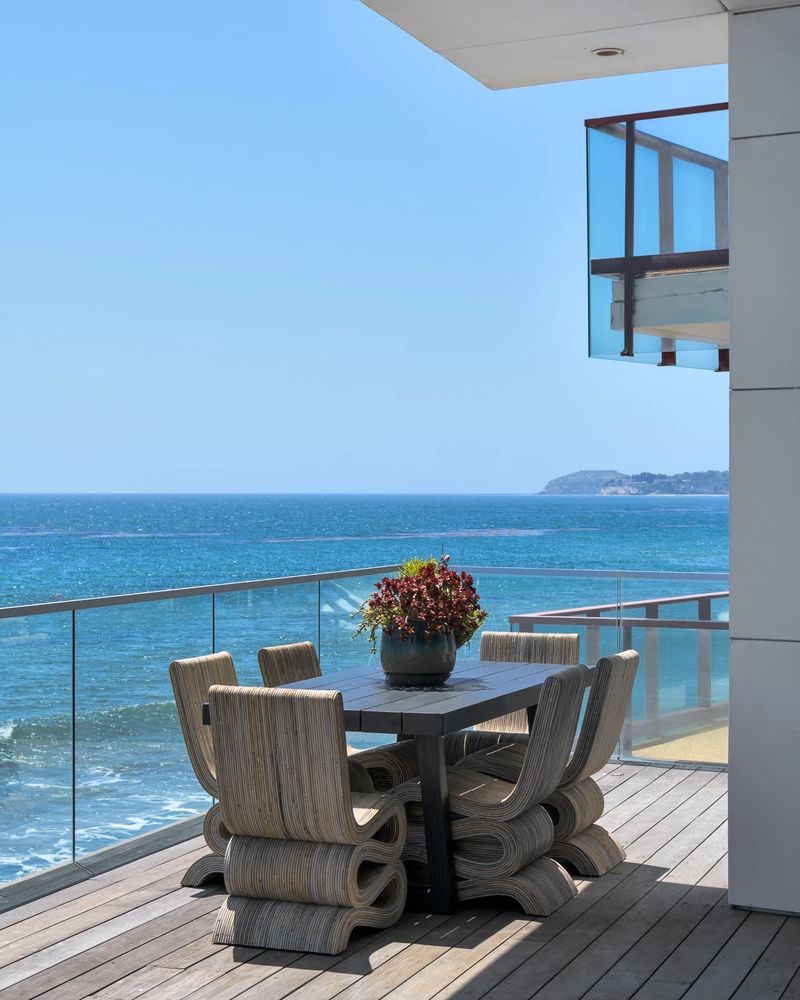 Terrace dining under canopy at 26814 Malibu Cove Colony Drive, Malibu — photo 6 of 10