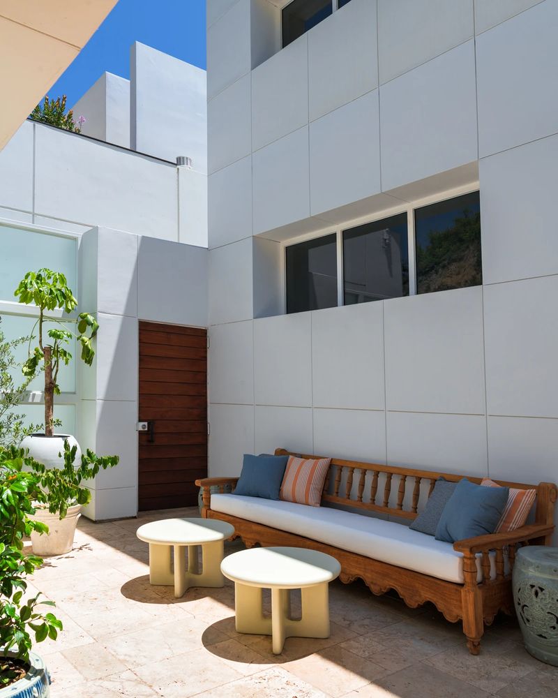 Stone-tiled entry courtyard at 26814 Malibu Cove Colony Drive, Malibu — photo 8 of 10