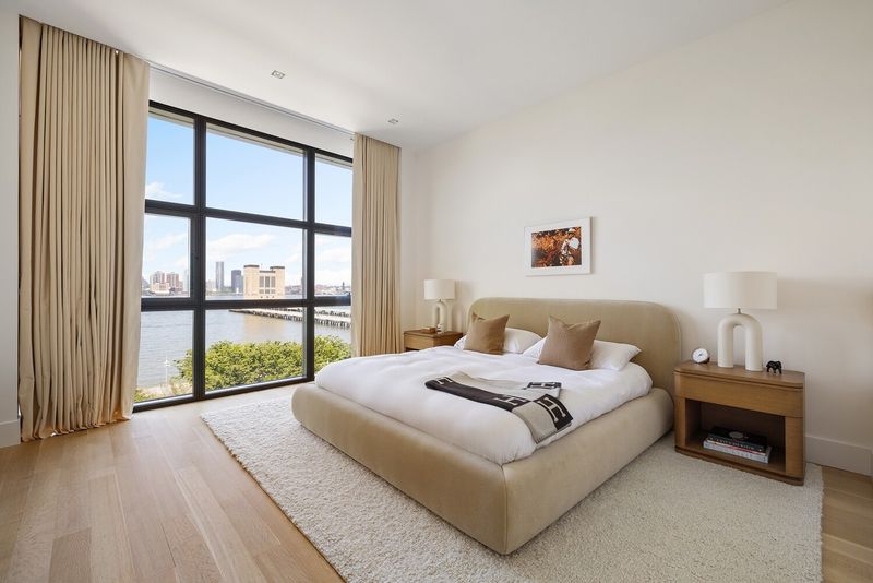 Primary bedroom overlooking the Hudson at 290 West Street 5B, Tribeca — photo 7 of 12