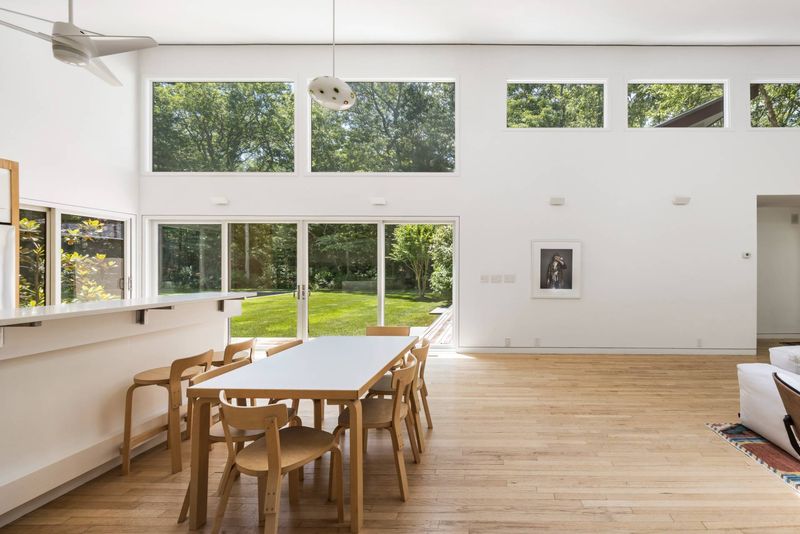 Dining under clerestory windows at 3 Whale Rock Lane, East Hampton — photo 7 of 8
