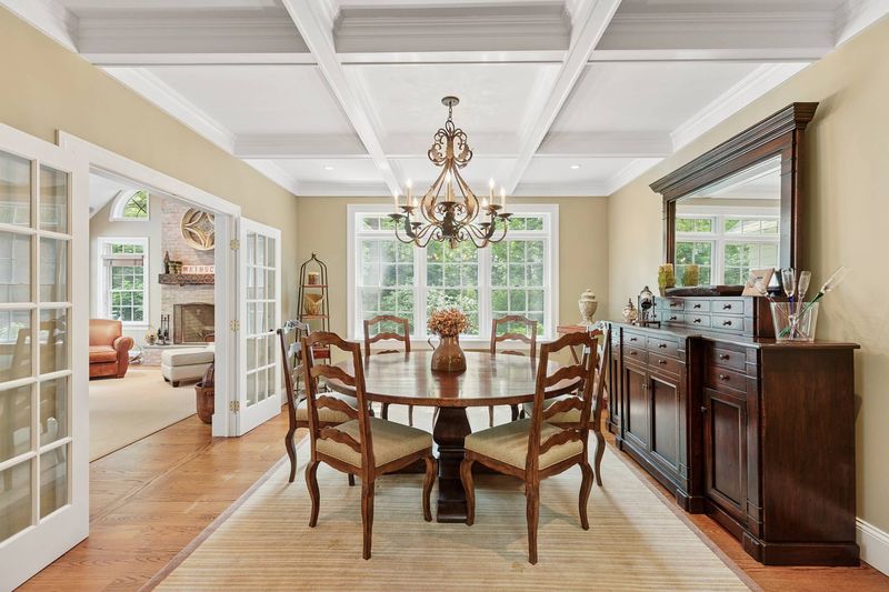 Formal dining, coffered ceiling at 3 Whitney Lane, Wainscott — photo 4 of 8