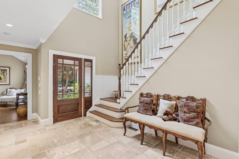 Entry hall and staircase at 3 Whitney Lane, Wainscott — photo 7 of 8