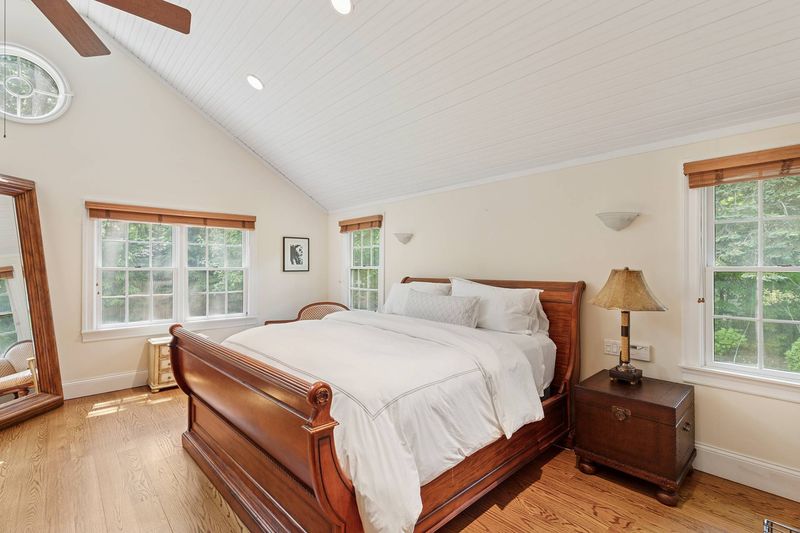 Primary bedroom vaulted ceiling at 3 Whitney Lane, Wainscott — photo 8 of 8