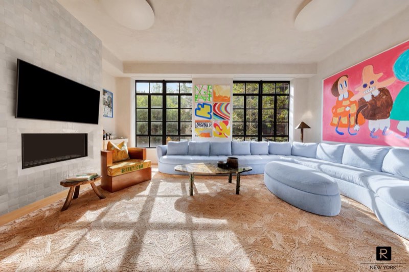 living room with blue sectional at 30 Sullivan Street
