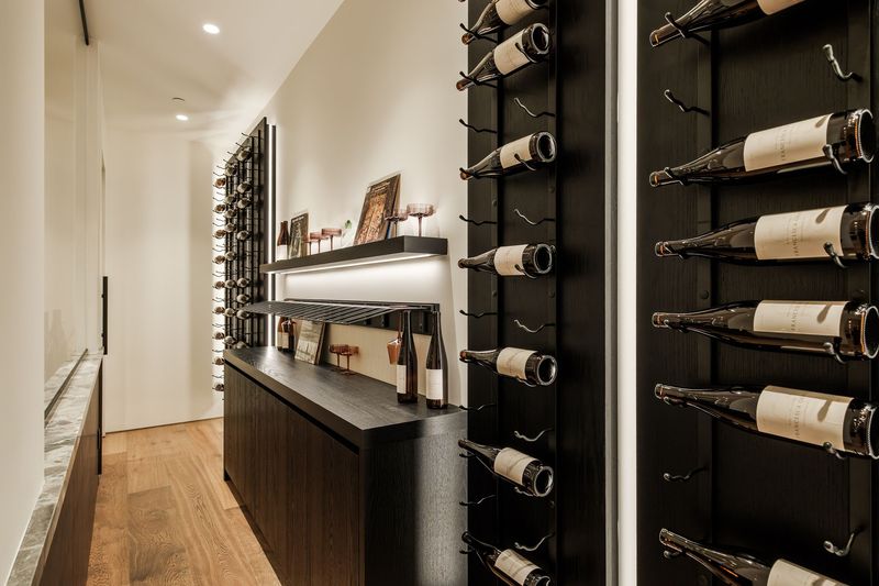 Wine wall in the lower-level wine room at 317 South Wetherly Drive, Beverly Hills — photo 7 of 9
