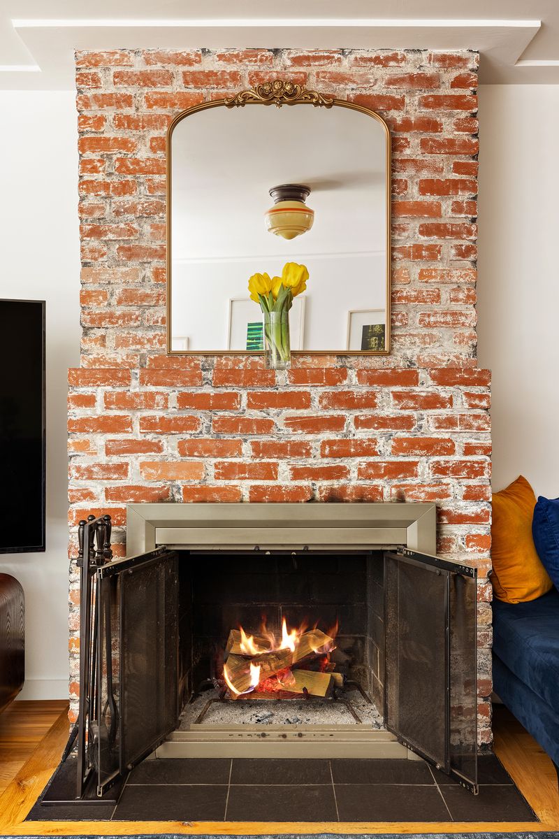Wood-burning fireplace at 338 Metropolitan Avenue, Williamsburg — photo 4 of 9
