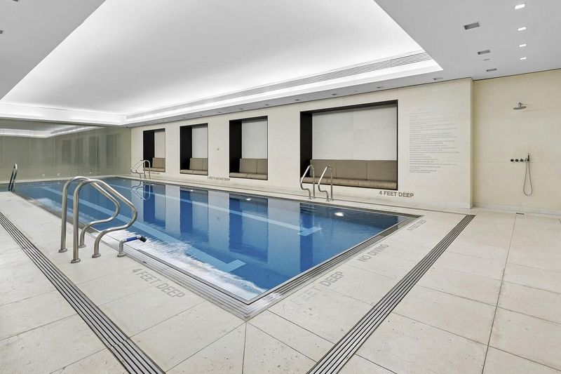 Indoor lap pool in the Trophy Club at 400 East 67th Street 27A, Lenox Hill — photo 7 of 8