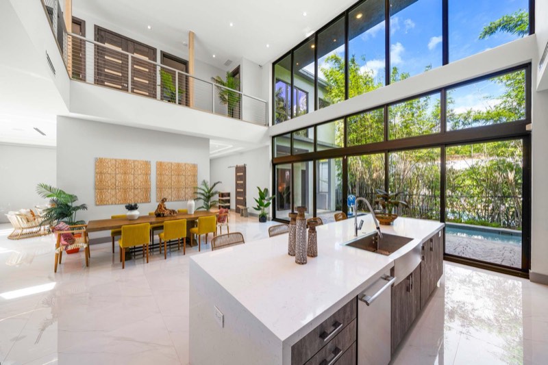 island toward dining and upstairs gallery at 4185 Ventura Avenue