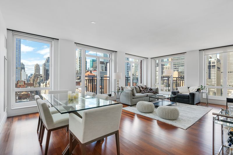 Corner living and dining room at 45 Park Avenue 2101, Murray Hill