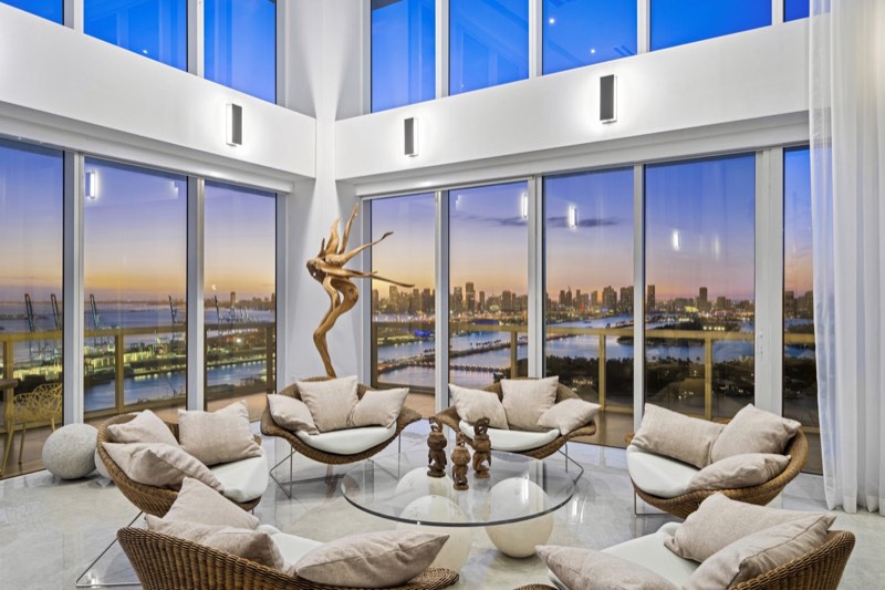 double-height living at dusk at ICON South Beach PH-1