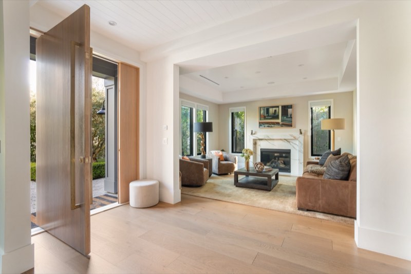 foyer through oak door into living