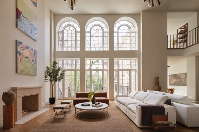 double-height living room at 48–50 West 69th Street