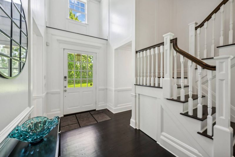 Double-height foyer and stair at 5 New Lane, Southampton — photo 11 of 12