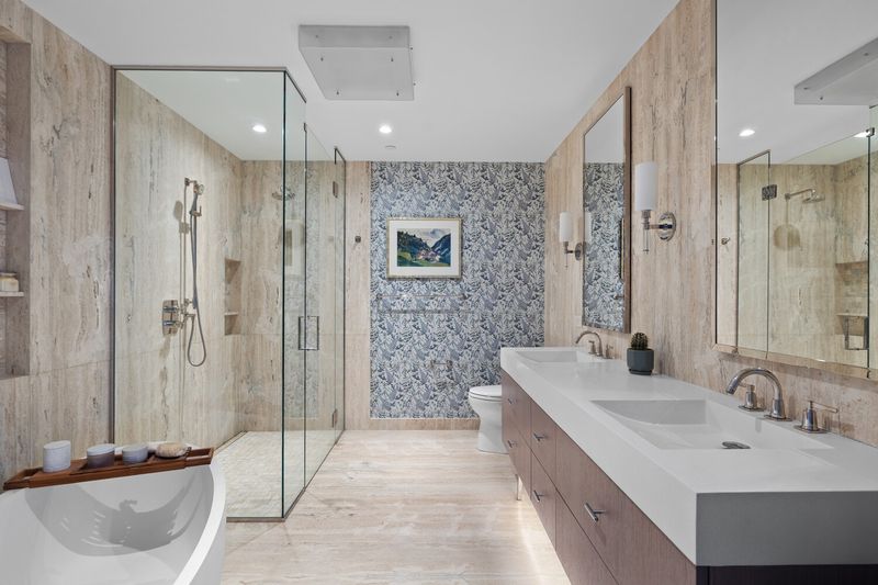 Primary bath with glass shower and double vanity at 50 Bridge Park Drive 16B, Brooklyn Heights — photo 8 of 12