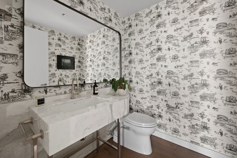Powder room with toile wallcovering at 50 Bridge Park Drive 16B, Brooklyn Heights — photo 10 of 12
