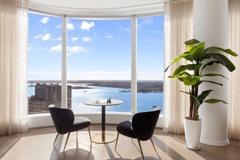 Window seating over the Hudson at 50 West Street 37C, Financial District — photo 3 of 9
