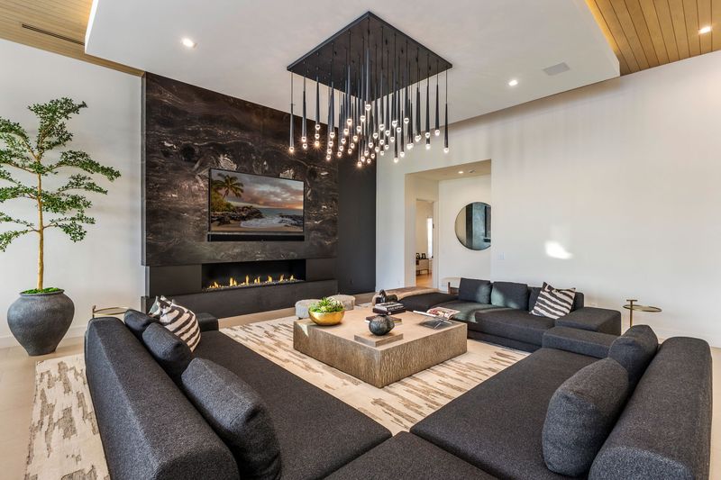 Living room linear fireplace at 5441 E Via Buena Vista, Paradise Valley — photo 7 of 10
