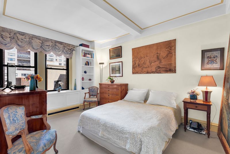 Primary bedroom with window valances at 55 East 86th Street 8B, Carnegie Hill — photo 5 of 9