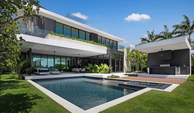 day pool rear facade at 5515 Pine Tree Drive