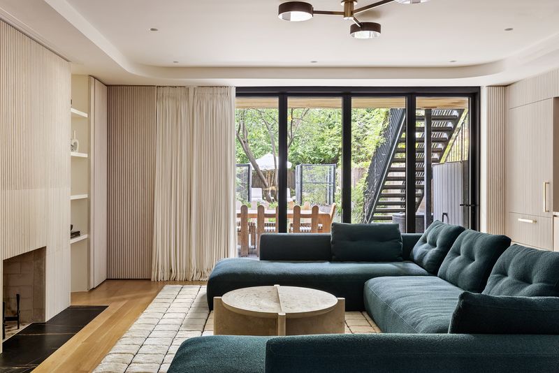 Garden-level family room opening to the garden at 59 Lefferts Place, Clinton Hill — photo 8 of 10
