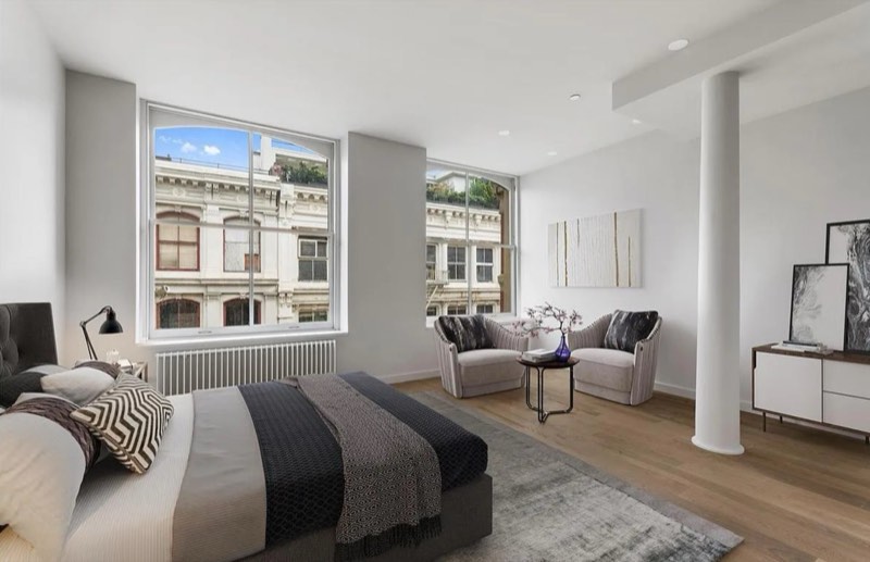 virtually staged primary bedroom at 63 Greene Street 5A