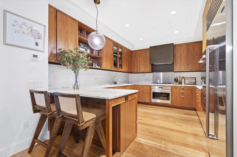 kitchen island, walnut cabinets, marble